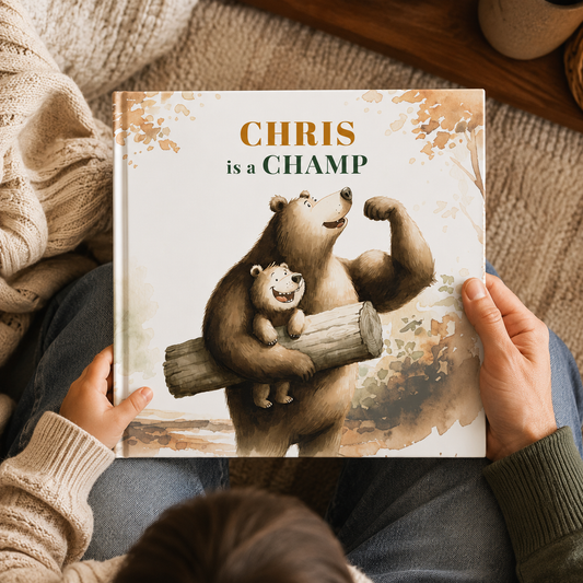 Book titled 'Chris is a Champ' with a bear illustration held by two hands.